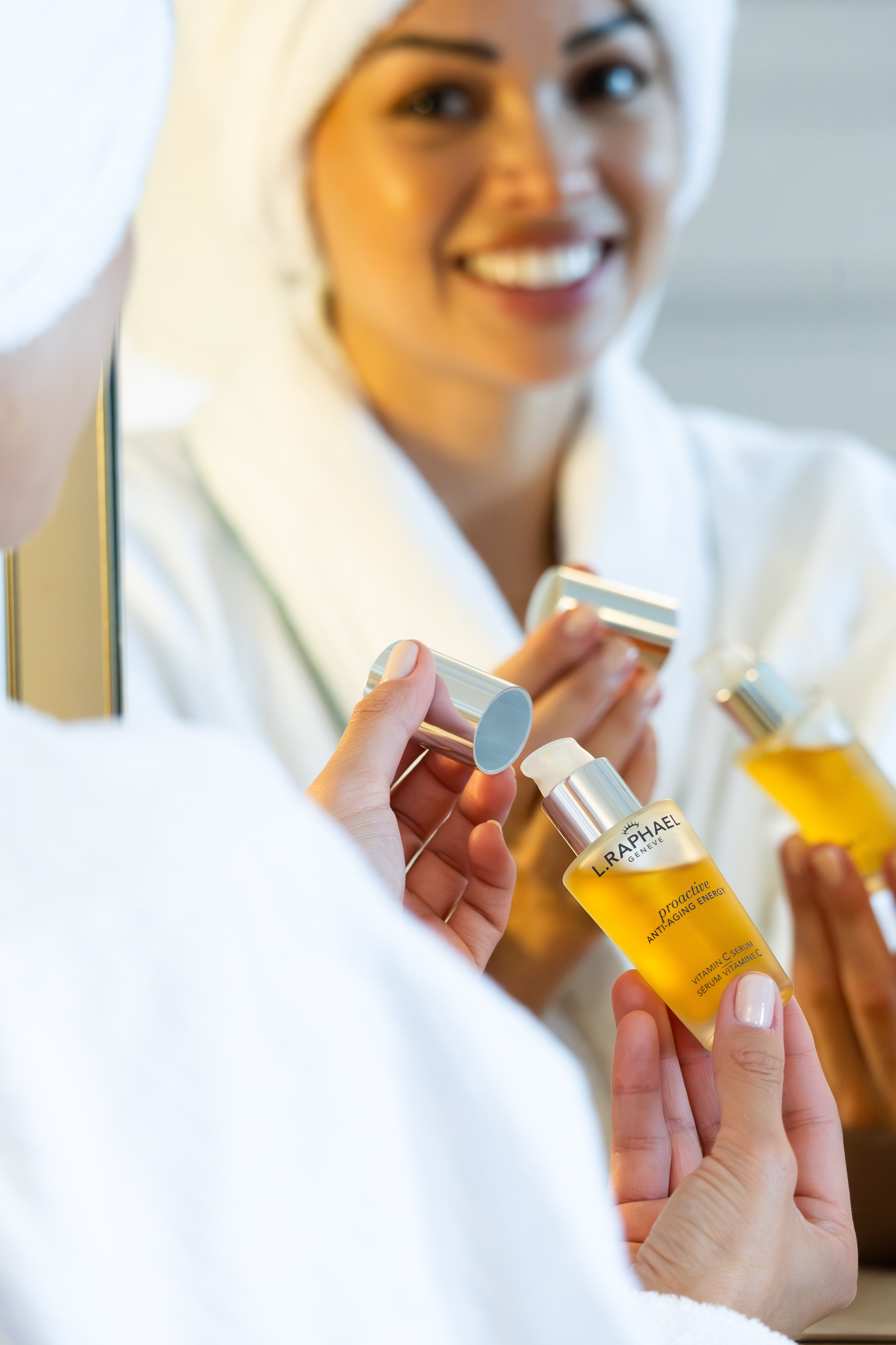 Woman applying face cream in luxury skincare routine