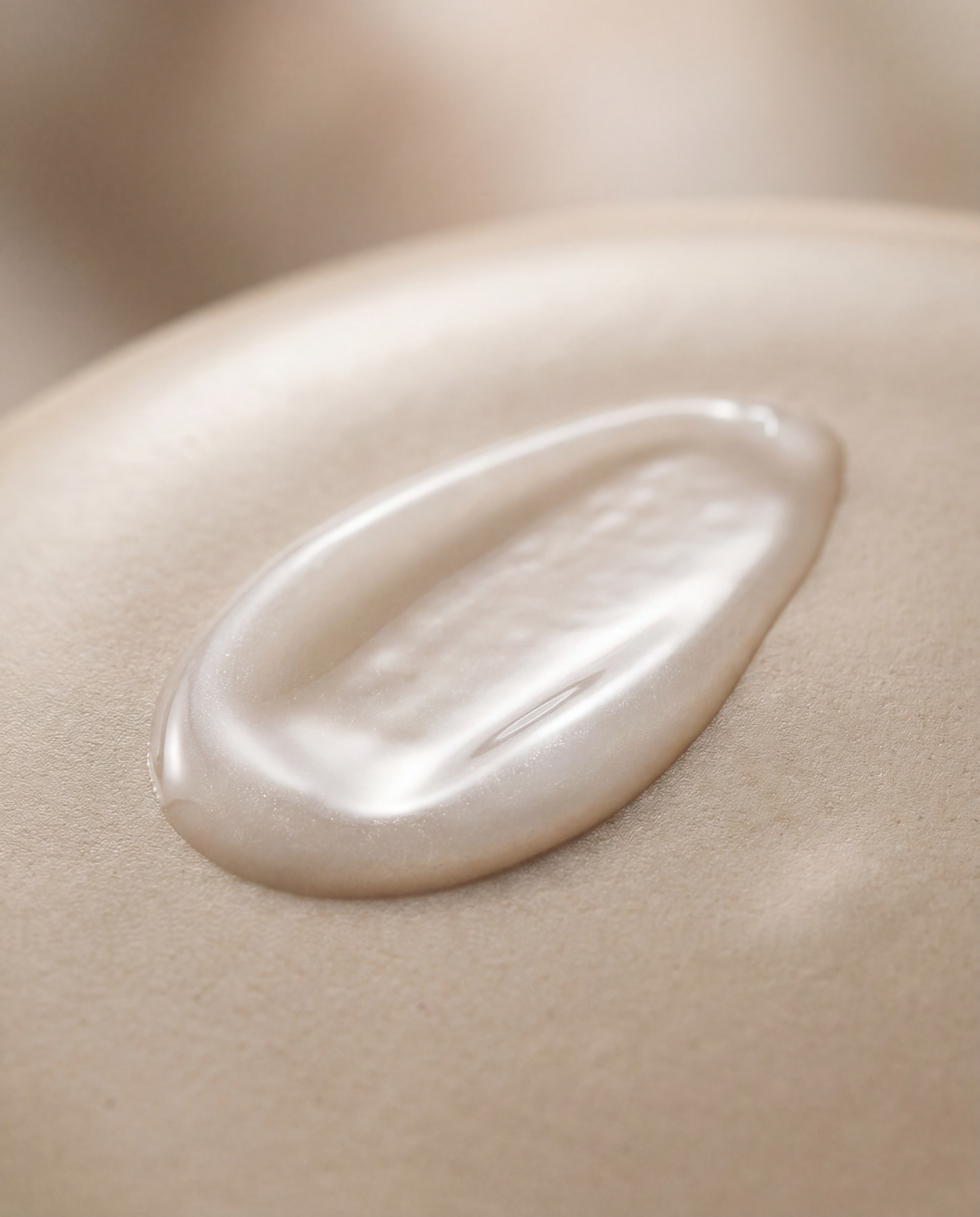 Close-up of a droplet of cream on skin